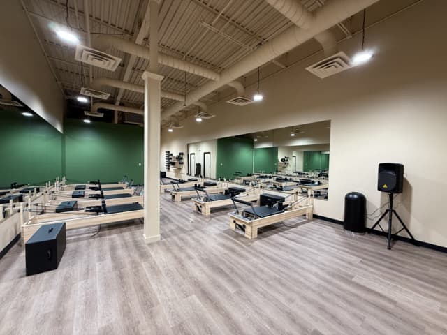 Pilates studio buildout — open workout floor, Kennesaw, GA